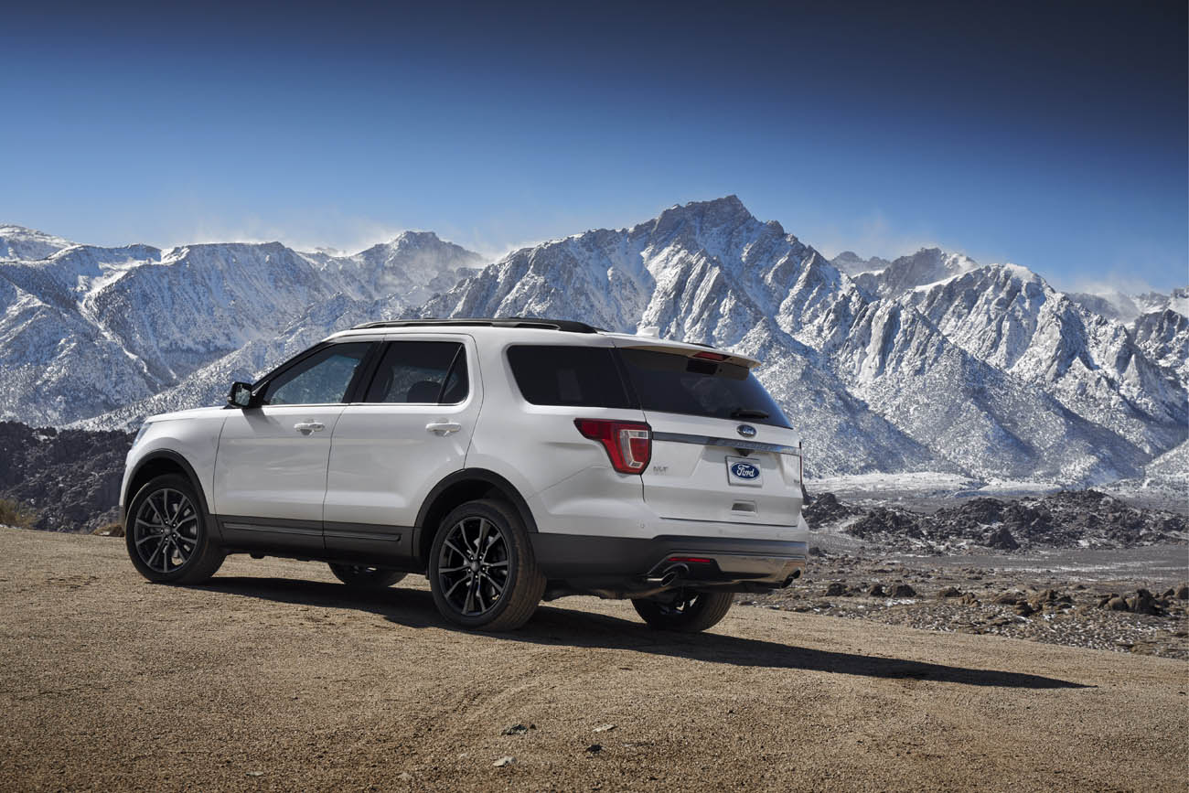 Exterior updates on the 2017 Ford Explorer XLT Sport Appearance Package include 20-inch Magnetic Gray painted wheels and black body side cladding. Preproduction model shown; available summer 2016.