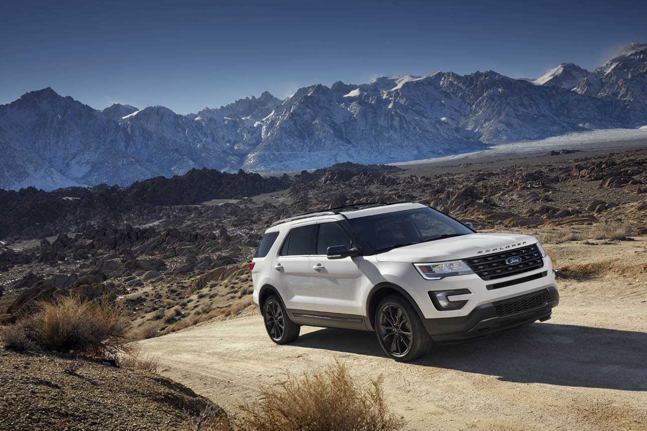 Exterior updates on the 2017 Ford Explorer XLT Sport Appearance Package include 20-inch Magnetic Gray painted wheels, black body side cladding and Magnetic Gray grille. Preproduction model shown; available summer 2016.